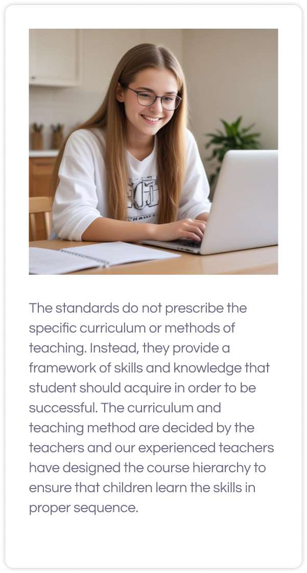 girl wearing glasses studying algebra 1 with laptop on table